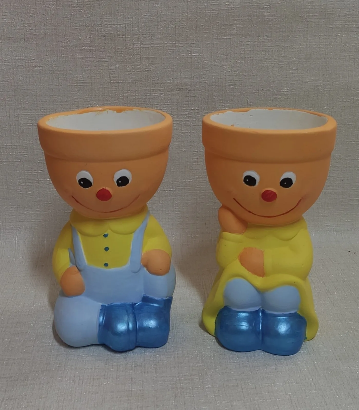 Гіпсові кашпо хлопчик і дівчинка