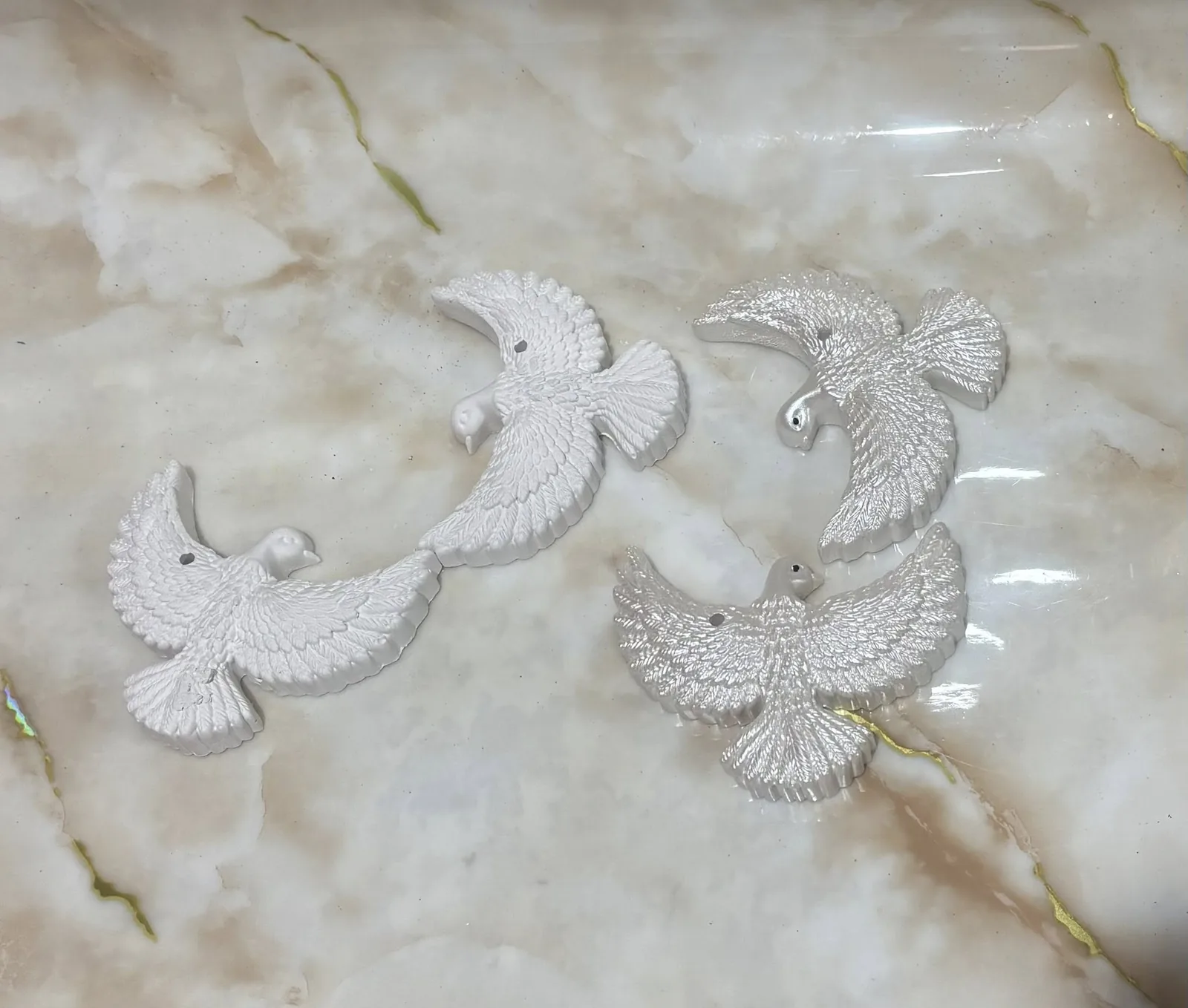 Гіпсові кашпо у формі птахів