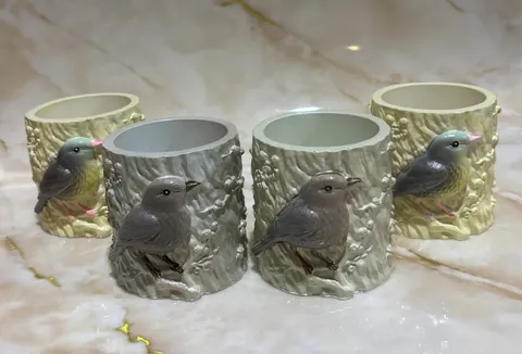 Гіпсові кашпо з пташками
